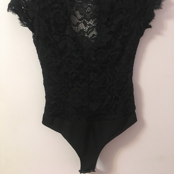 Lacy party bodysuit (top) with low v-cut front and open back - Picture 3 of 6